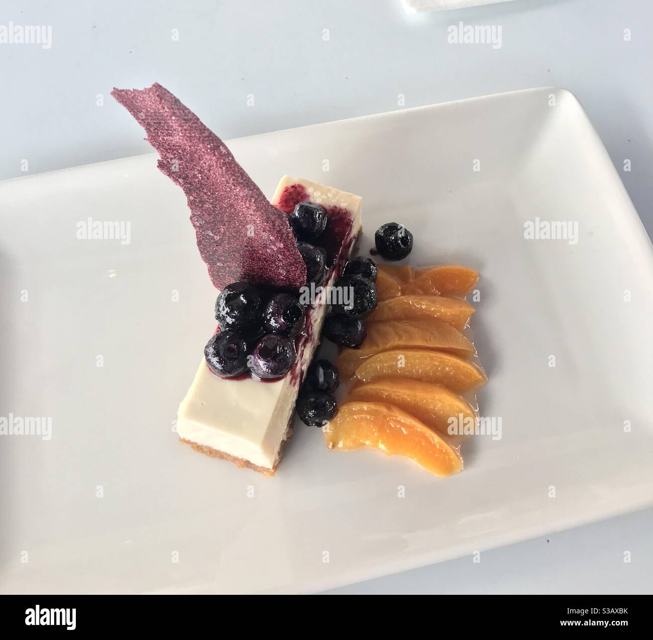 Vegan cheesecake, blueberry and apricots - Smartphone Captured Stock Image