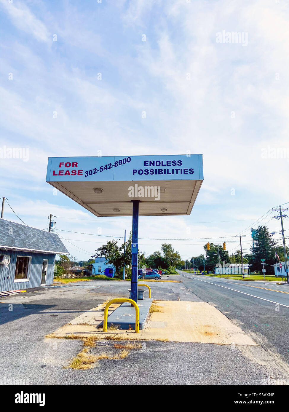 A dilapidated gas station with a sign that reads “Endless Possibilities” in Frederica, Delaware on September 8, 2020. - Smartphone Captured Stock Image
