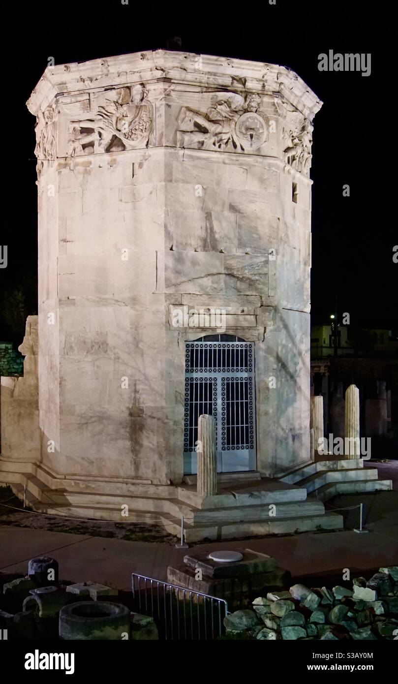The octagonal ‘Tower of the Winds’ in the Roman Agora, Athens, Greece. Built in Pentelic marble by Andronicus (1st C BC) it has weather vanes, sundial, hydraulic clock and 8 wind gods depicted. Stock Photo