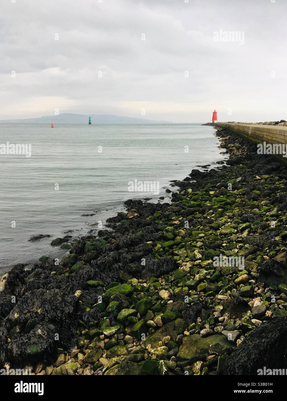Pier and lighthouse Stock Photo