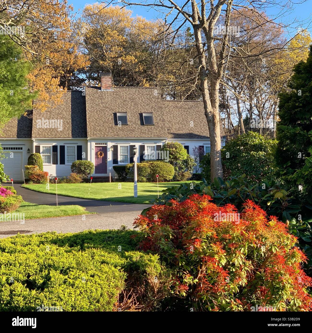 Springtime view of a home in a development on Cape Cod, Massachusetts, United States - Smartphone Captured Stock Image