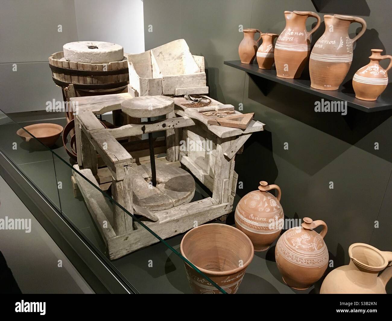 Lenck-villa exhibition - 19th century potter's wheel and pots, Sopron, Hungary - Smartphone Captured Stock Image