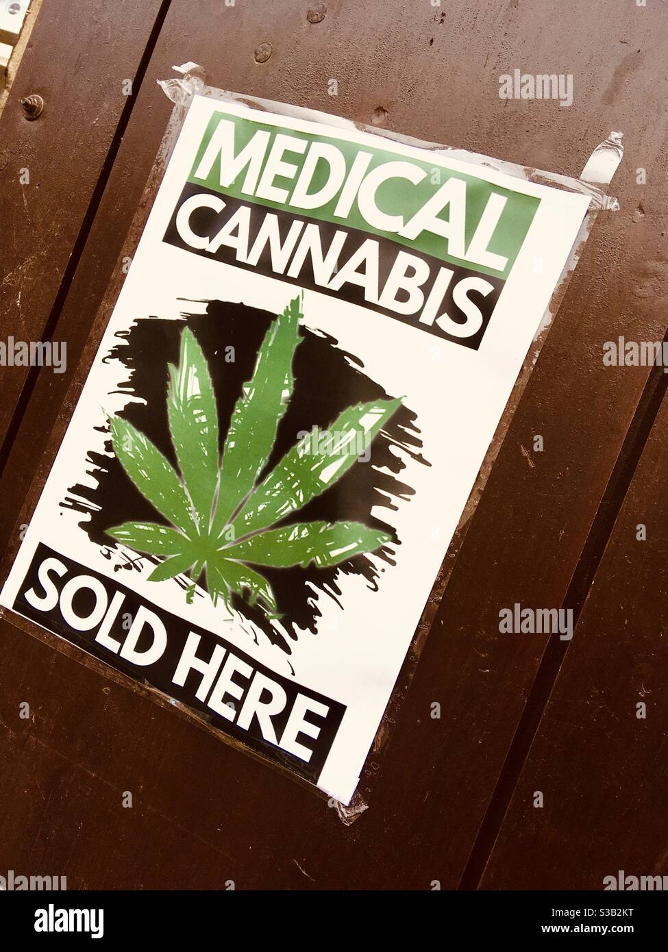 Medical cannabis sold here sign on shop, Hungary, Europe - Smartphone Captured Stock Image