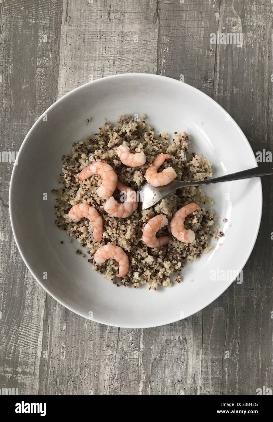 Red and white quinoa with fresh prawns - Smartphone Captured Stock Image