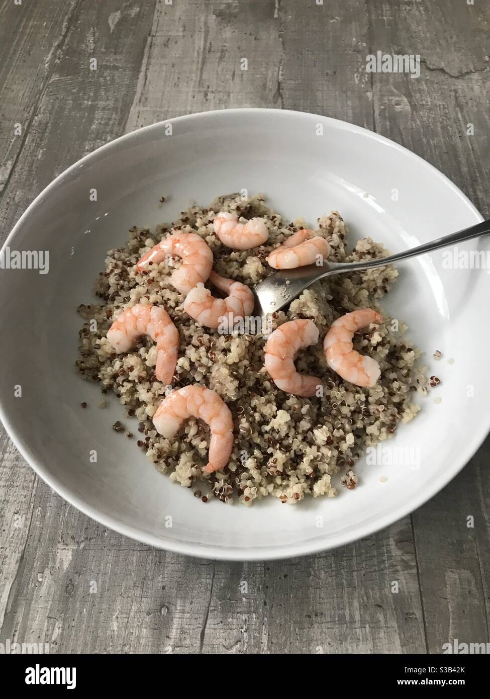 Red and white quinoa with fresh prawns - Smartphone Captured Stock Image