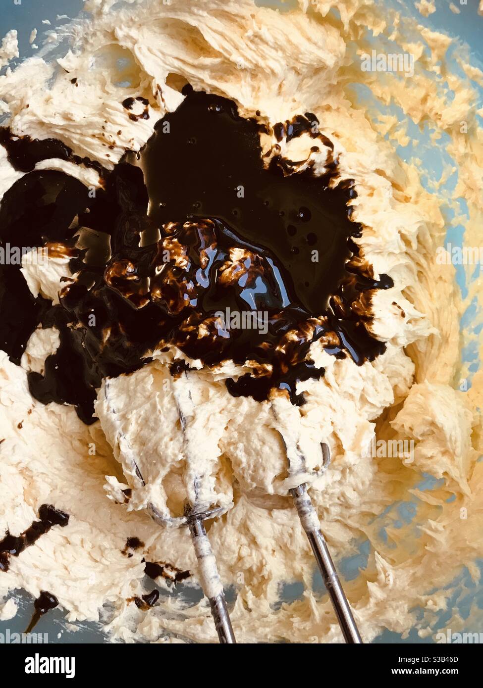 just added black treacle to Christmas Cake mixture - Smartphone Captured Stock Image