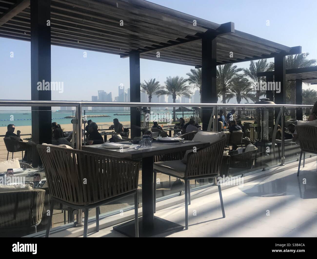 Outdoor terrace at La Mar Doha restaurant, Qatar - Smartphone Captured Stock Image