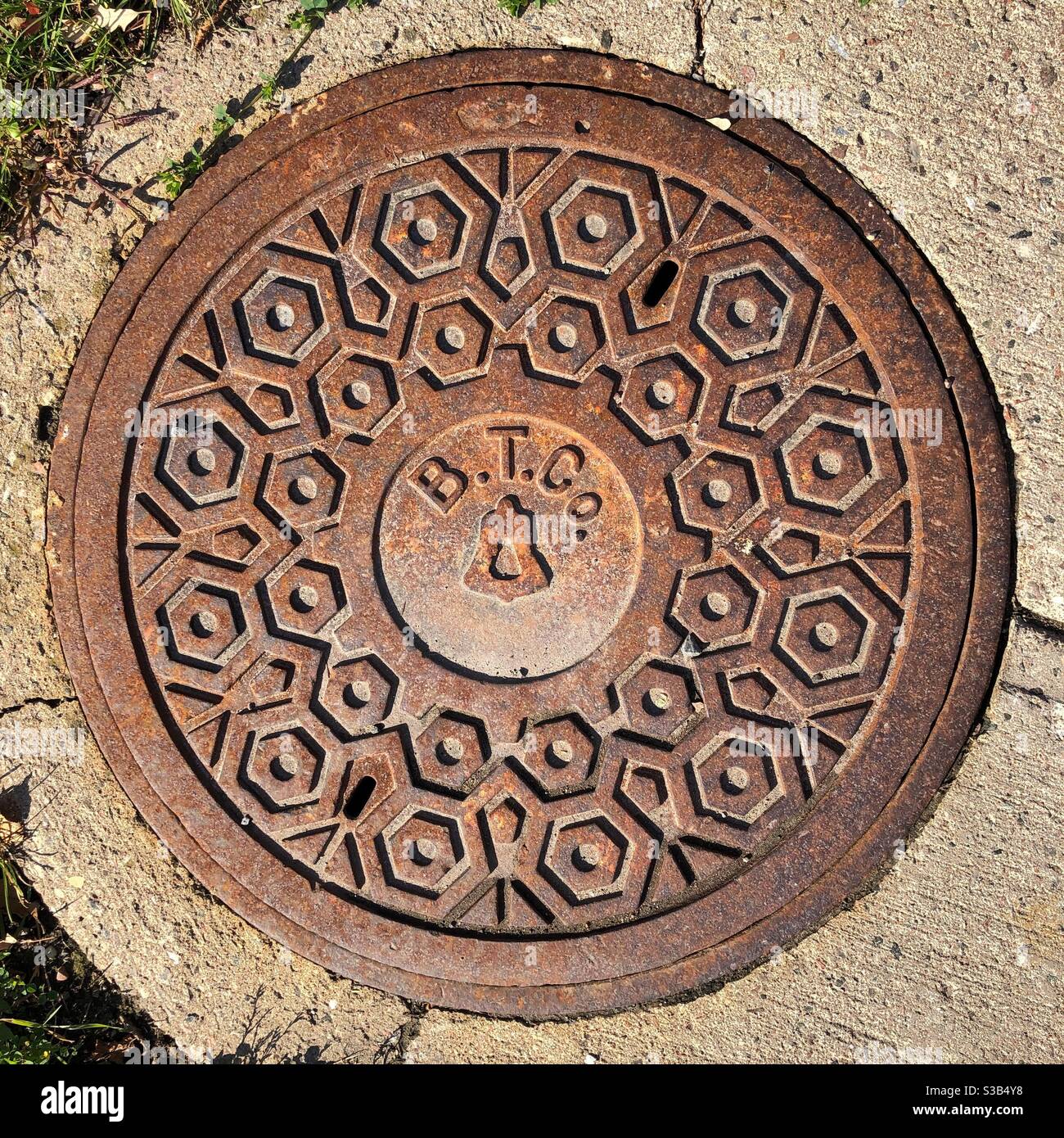 Manhole cover on the communication line in Renfrew, Ontario, Canada - Smartphone Captured Stock Image
