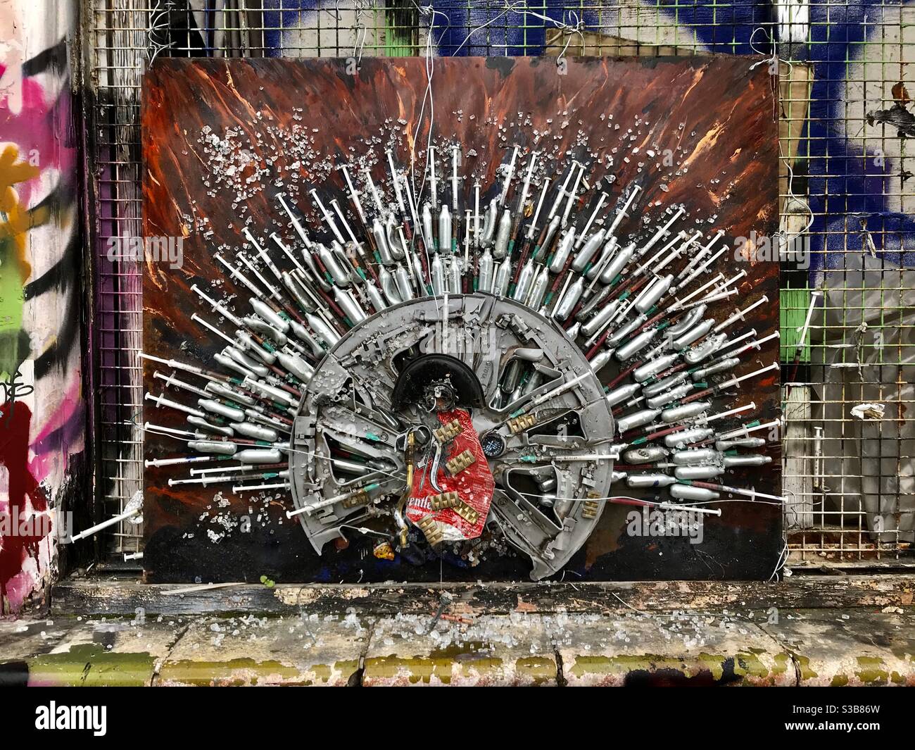 An amazing metal fan tailed sculpture on a wall in Homerton, east end of London,UK Stock Photo