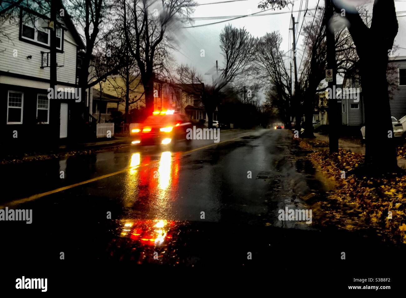 Emergency vehicle on a rainy street - Smartphone Captured Stock Image