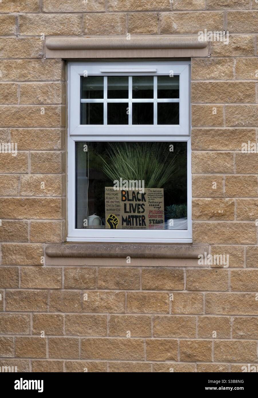 A Black Lives Matter sign in a window, West Yorkshire Stock Photo