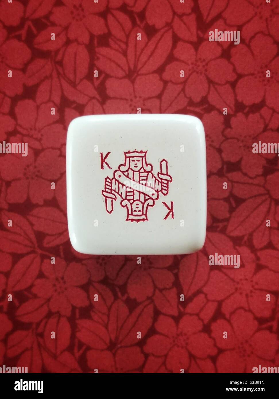 Face of a dice with the image of the king. Close up Stock Photo