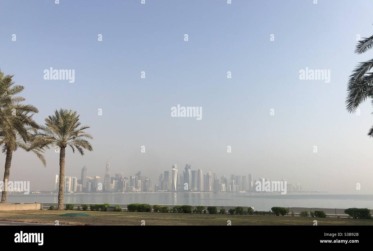 City skyline on a sunny day in Doha, Qatar - Smartphone Captured Stock Image