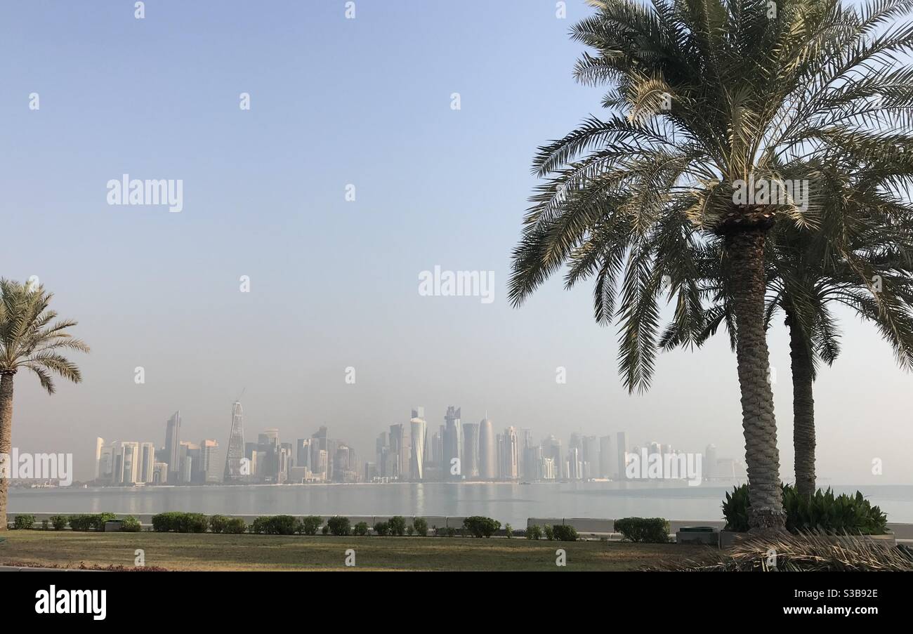 City skyline on a sunny day in Doha, Qatar - Smartphone Captured Stock Image