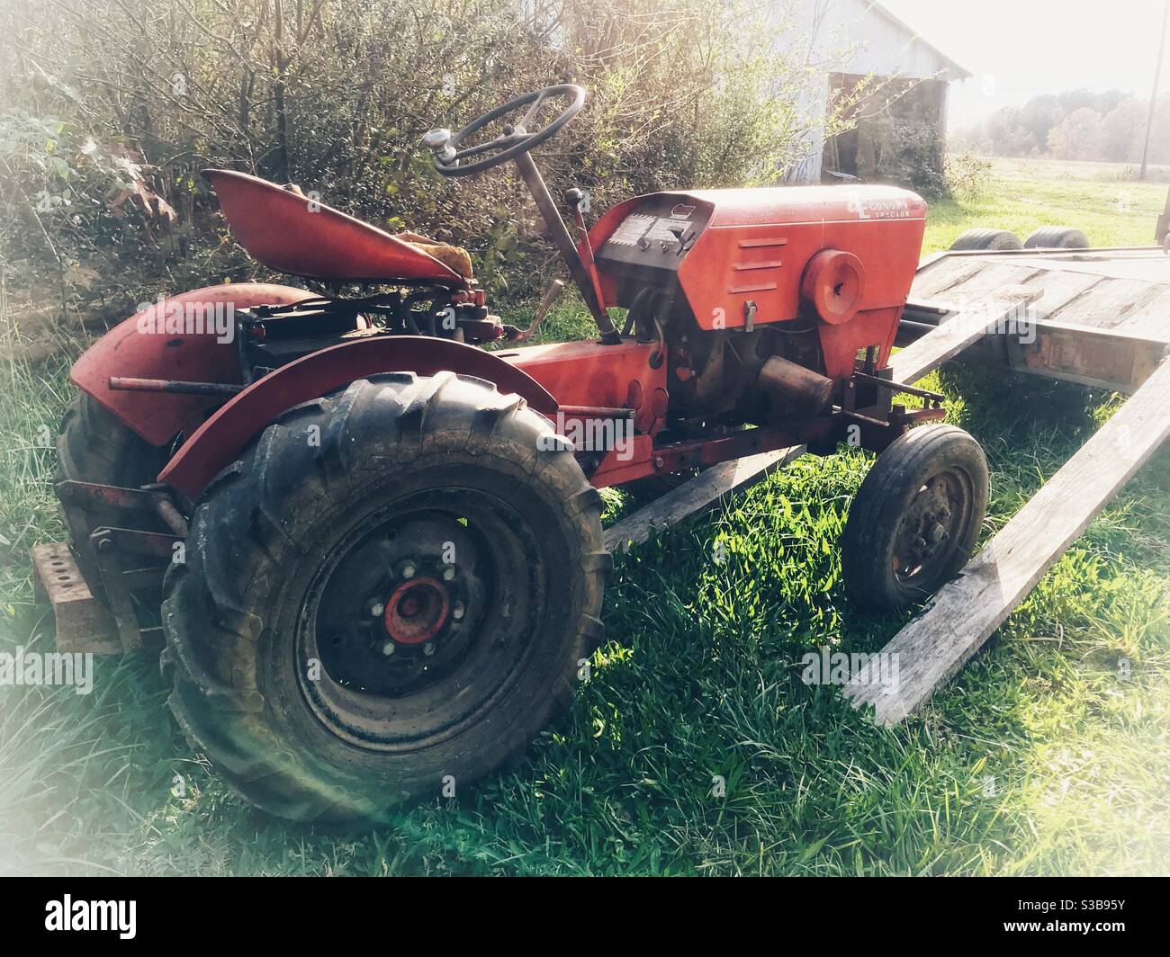 Small vintage tractor in late afternoon - Smartphone Captured Stock Image