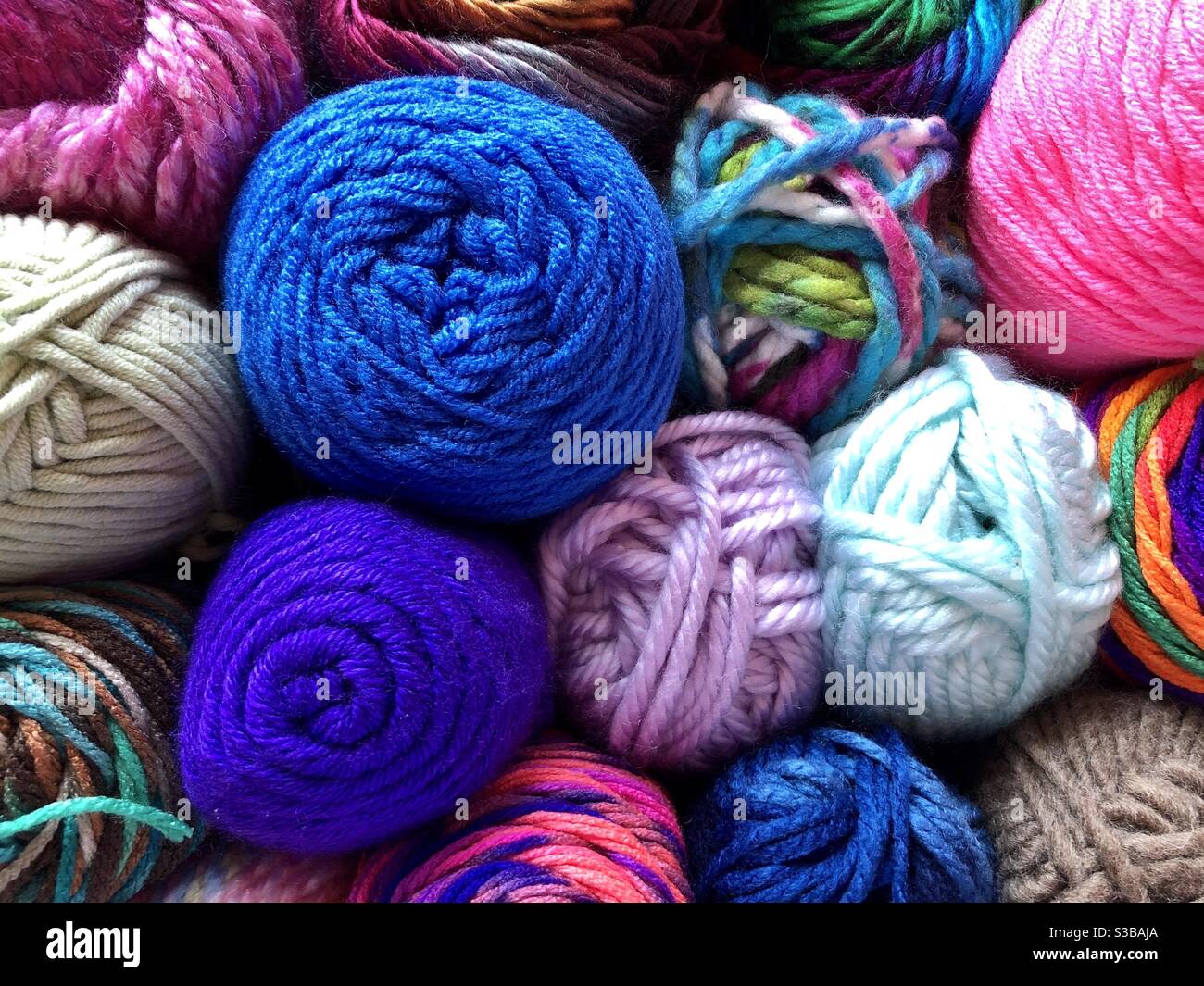 Full frame of assorted colorful yarns Stock Photo