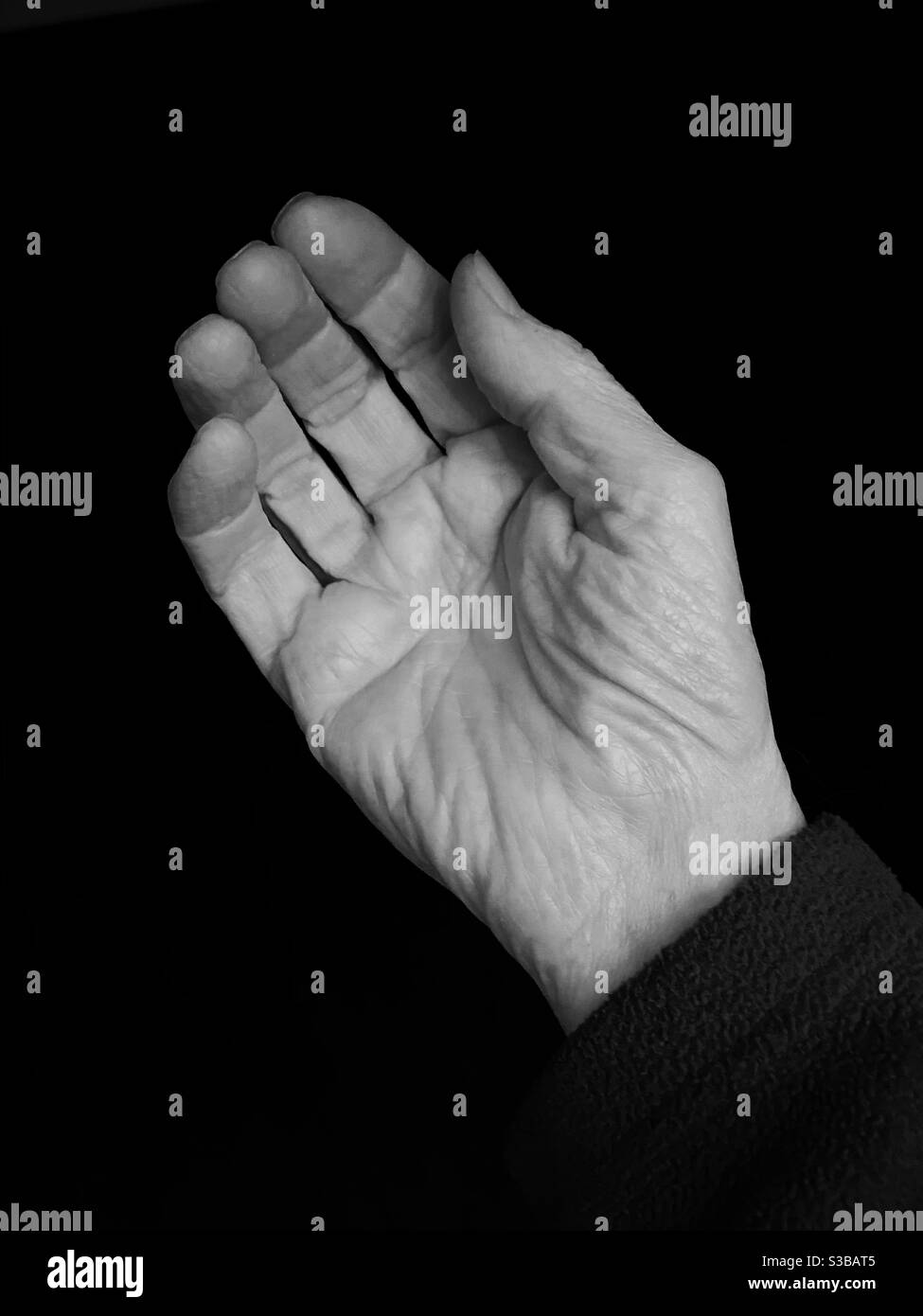 Senior man’s hand, in black and white Stock Photo