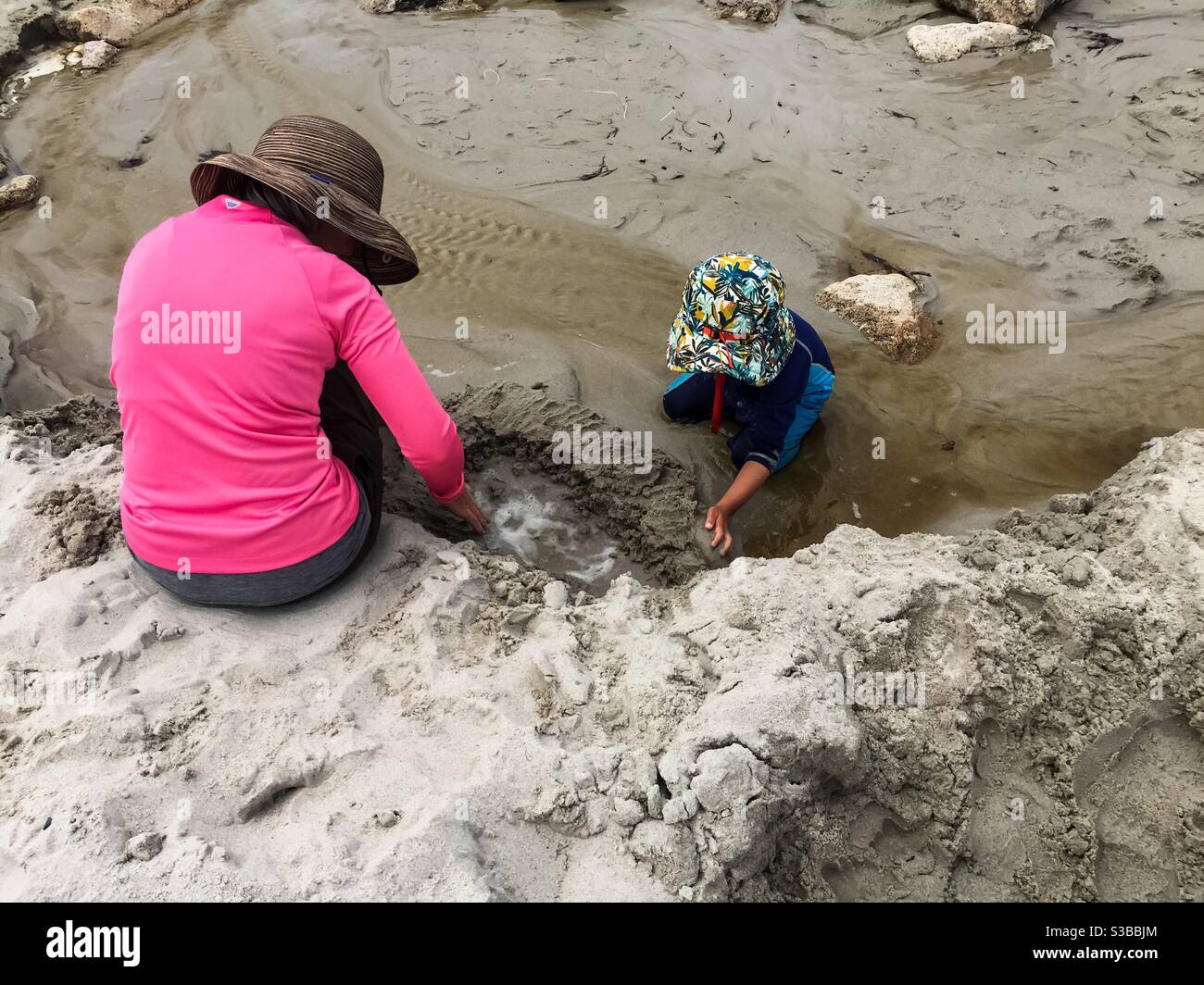 At the beach with grandma on a hot, sunny day, Nova Scotia, Canada - Smartphone Captured Stock Image