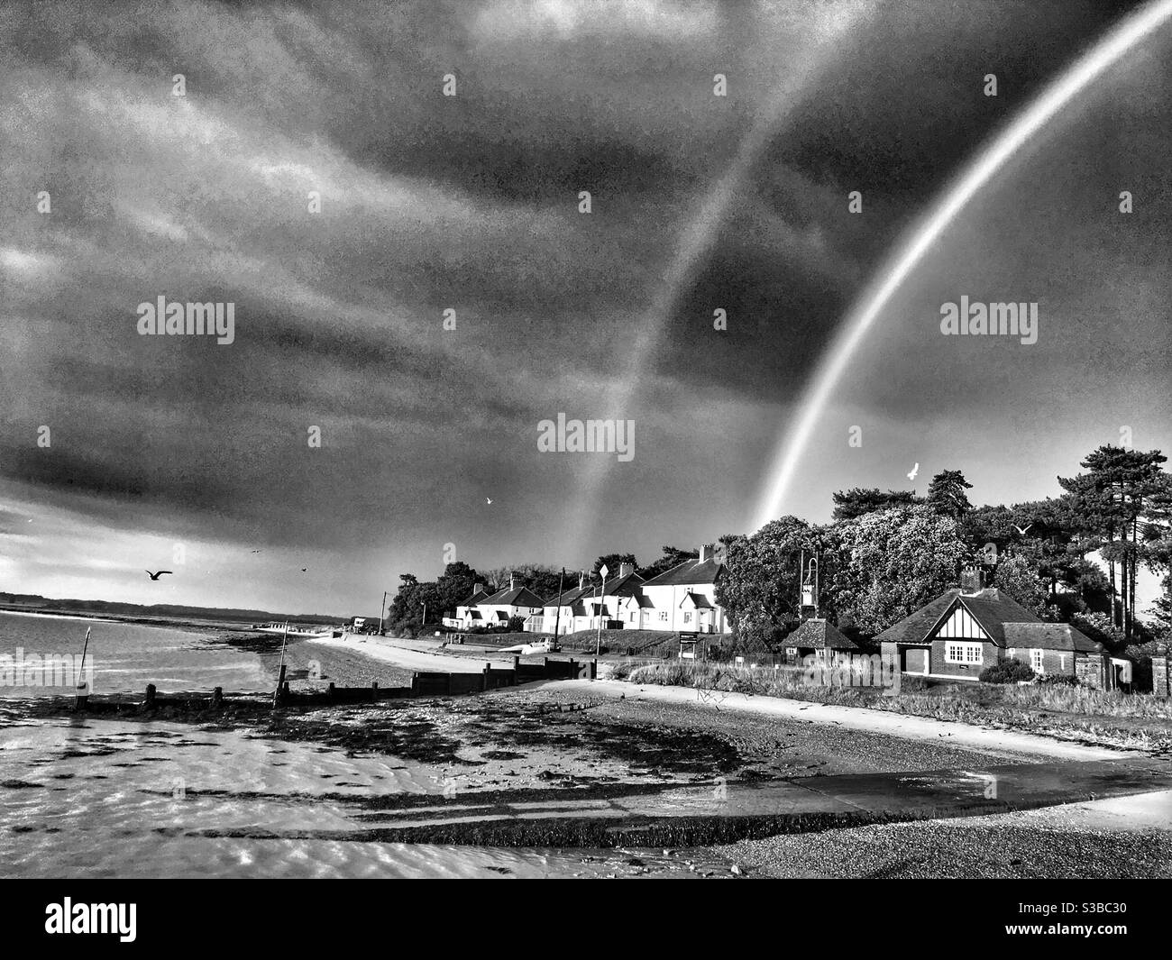 Double rainbow Bawdsey Ferry Suffolk England Stock Photo