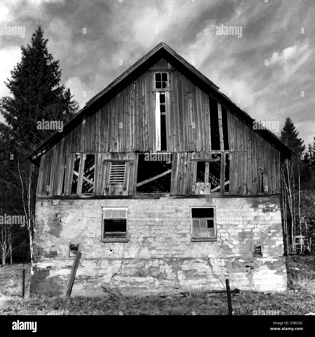 Abandoned old wooden barn at the Swedish countryside. - Smartphone Captured Stock Image