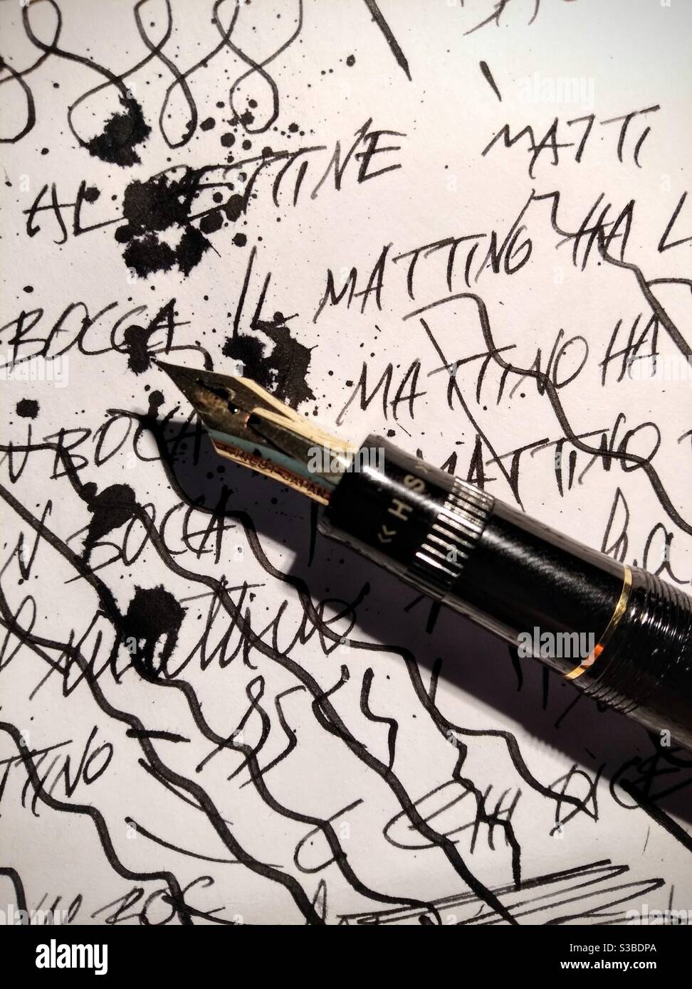 Fountain pen on a sheet of paper. Close up Stock Photo