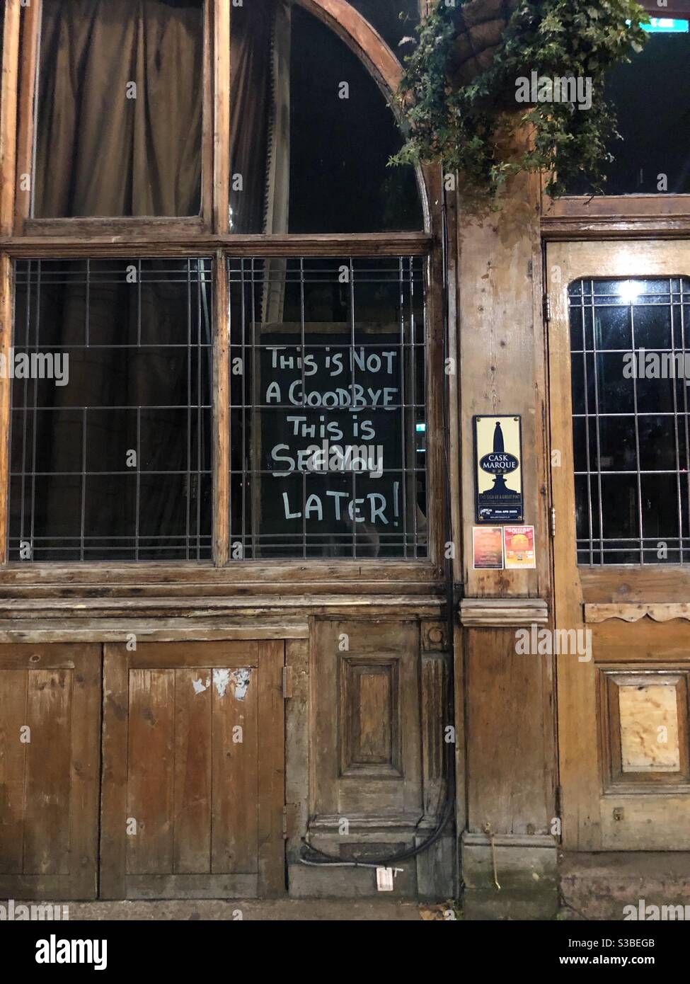 This is not a goodbye this is see you later sign outside a London Pub during Second lockdown - Smartphone Captured Stock Image