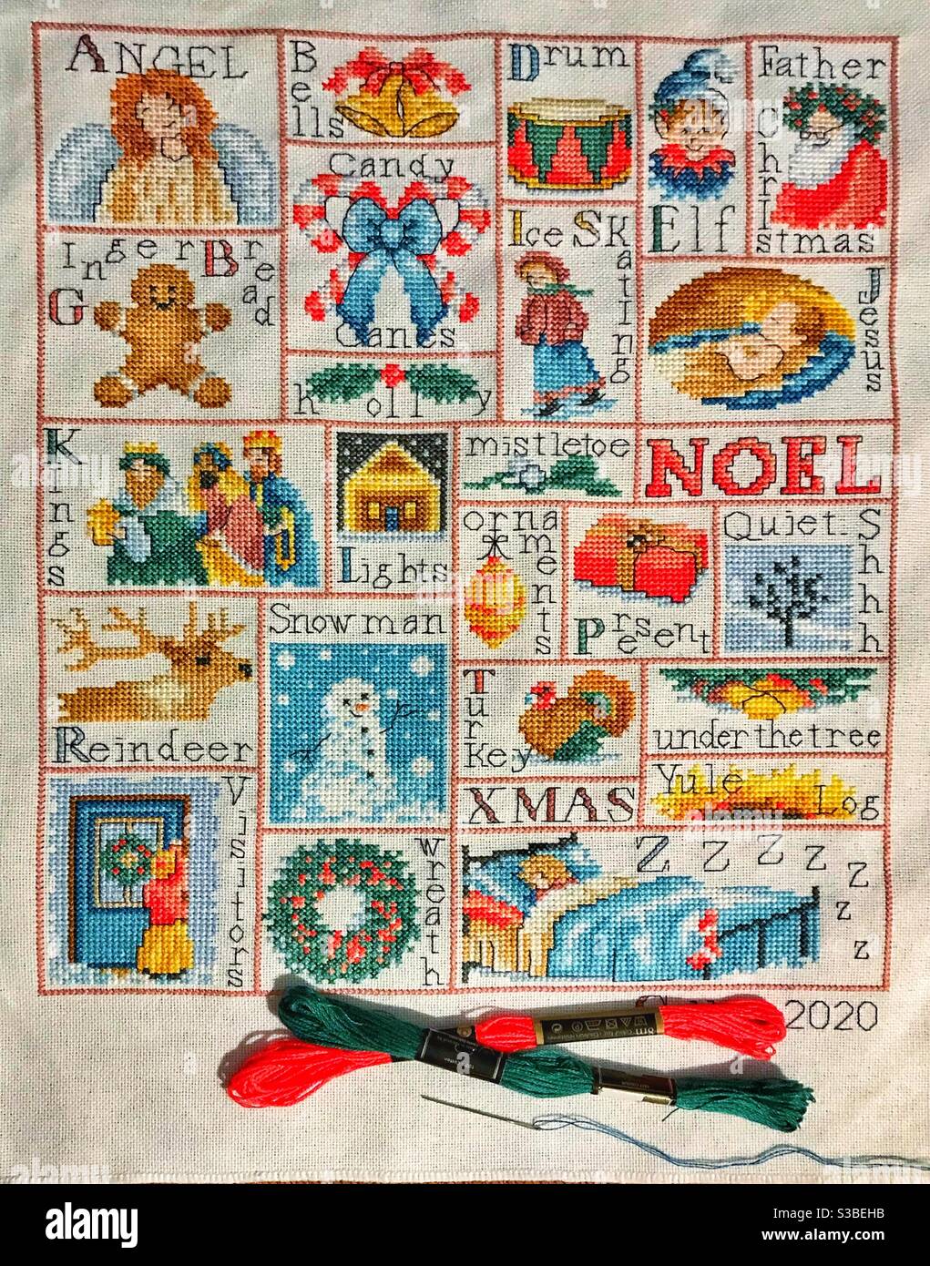 Christmas cross stitch sampler. - Smartphone Captured Stock Image