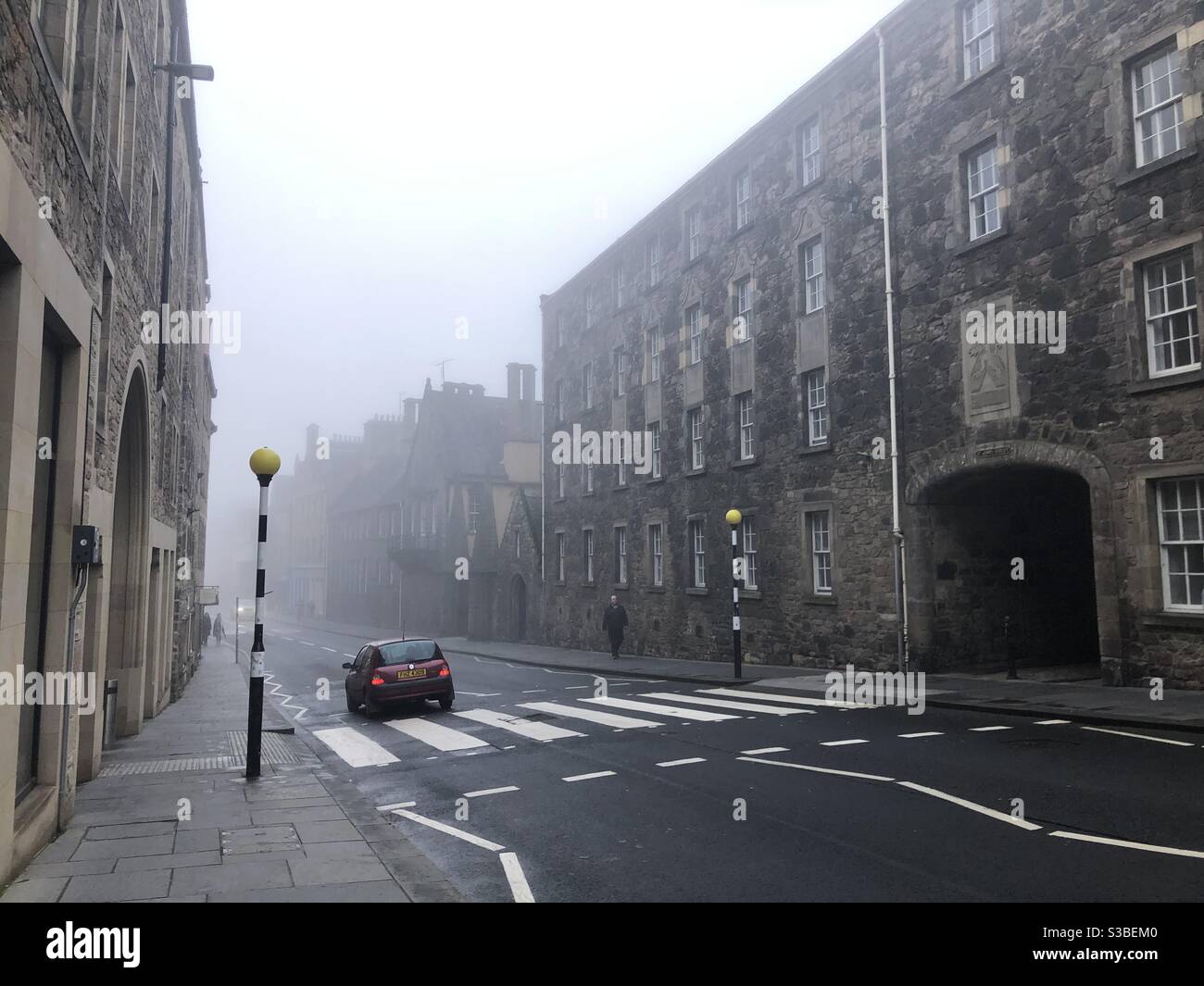 Foggy Autumn day - pedestrian zebra crossing  on the Royal Mile, Edinburgh Stock Photo