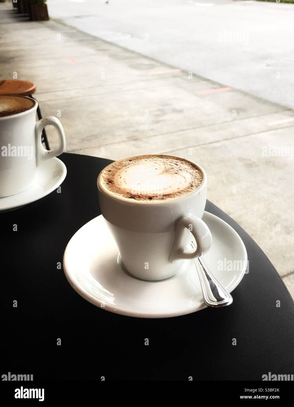 Cappuccino with soy milk with latte art Stock Photo Alamy