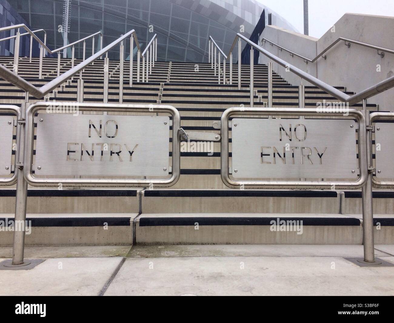 No entry barriers on the steps outside Tottenham Hotspur football stadium Stock Photo