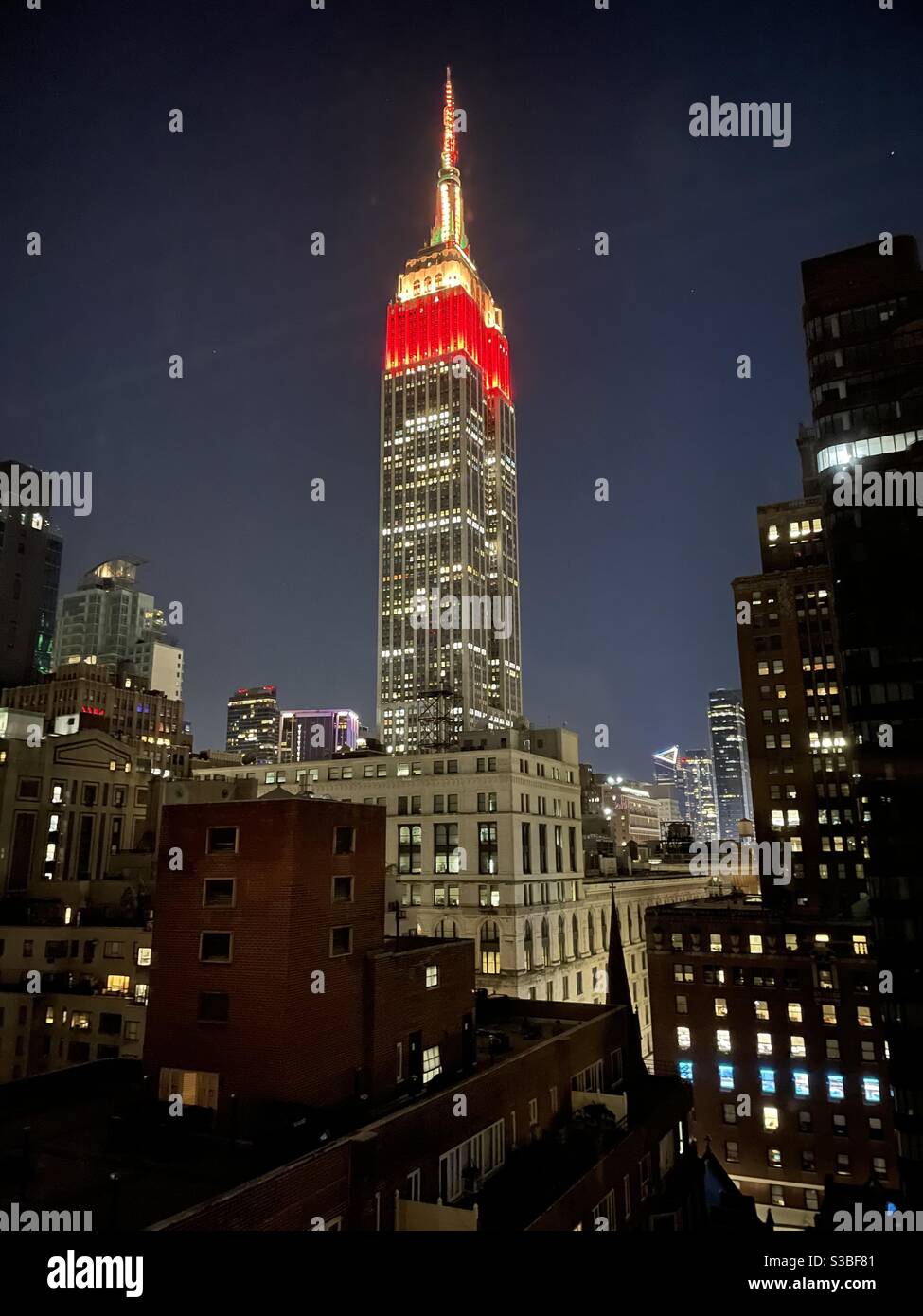 Empire State Building, NYC, USA lit up at night - Smartphone Captured Stock Image