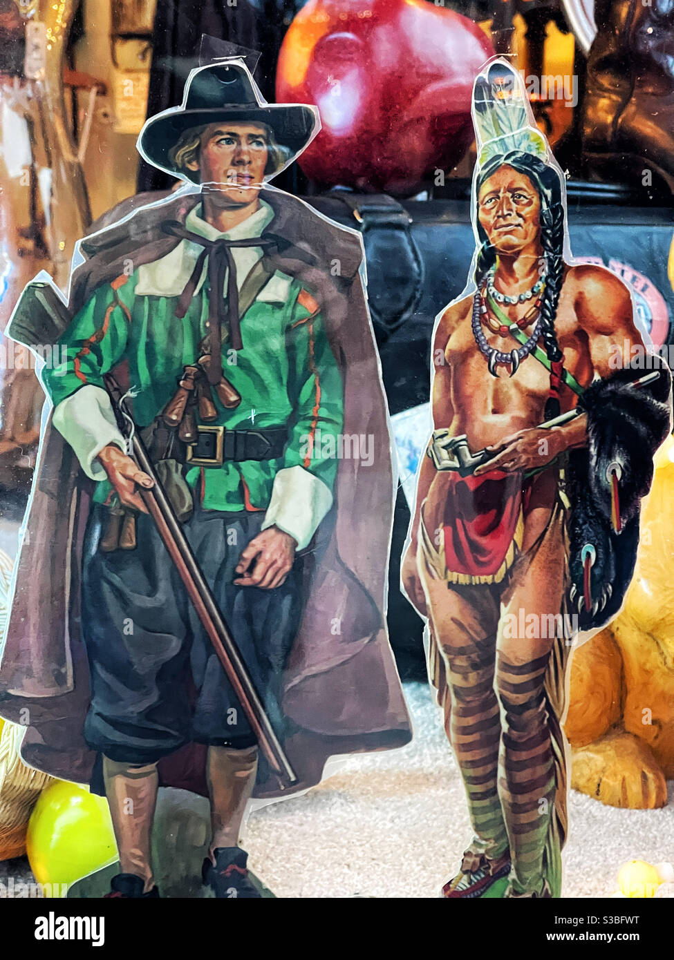 Vintage cutout illustrations of American pilgrim and Native American men - Smartphone Captured Stock Image