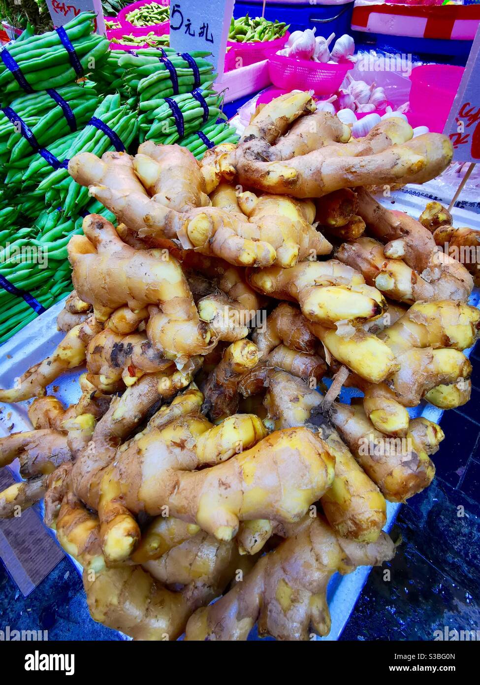 Fresh Ginger roots sold at the wet market in Wan Chai in Hong kong. - Smartphone Captured Stock Image