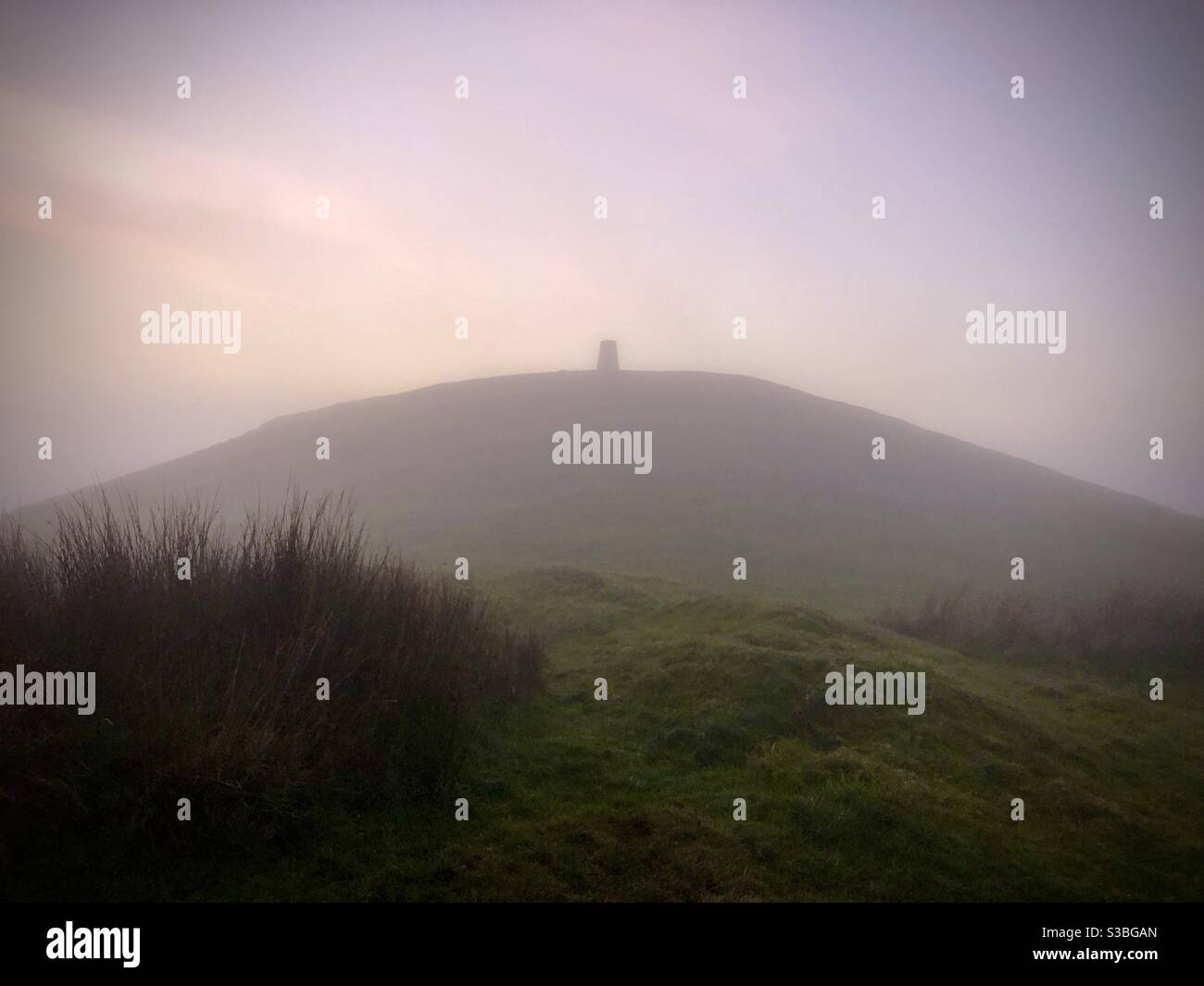 The peak of the Garth mountain shrouded in mist, Cardiff, South Wales in late November. Stock Photo