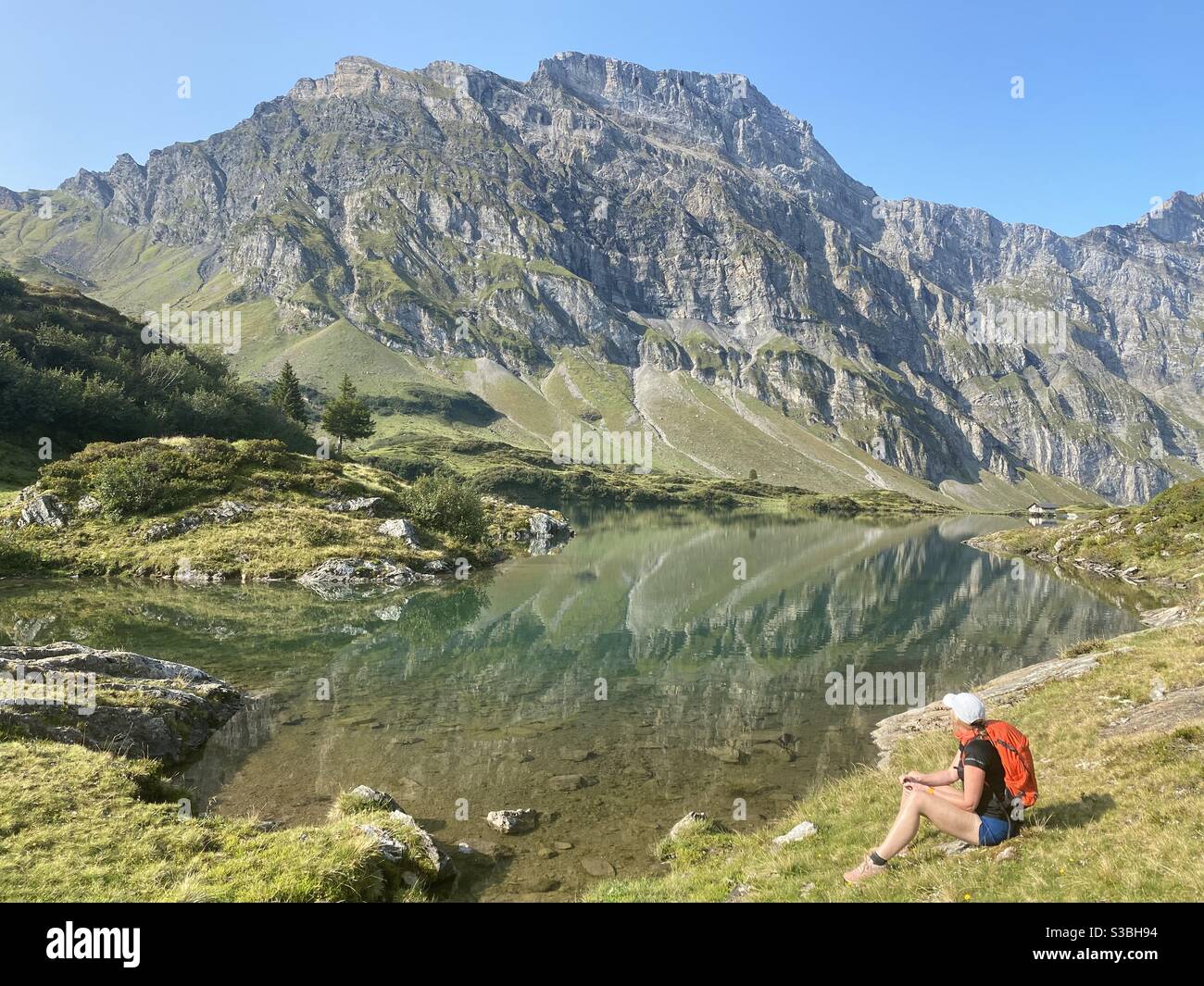 Hiking in Swiss alps Stock Photo