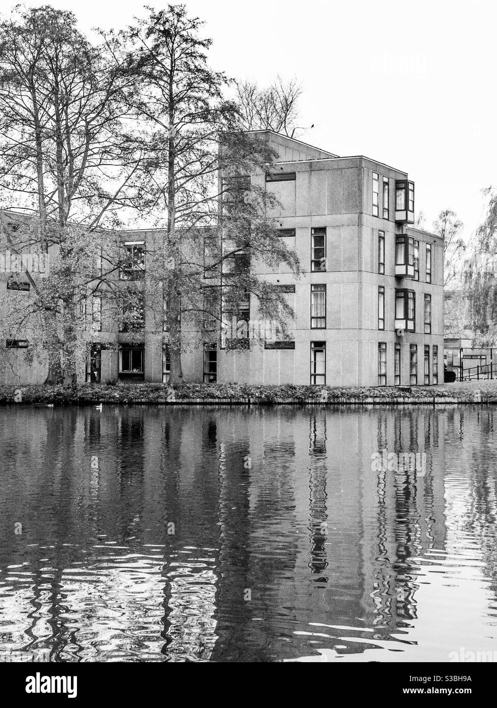 1960’s style building at edge of lake in winter, York University, UK - Smartphone Captured Stock Image