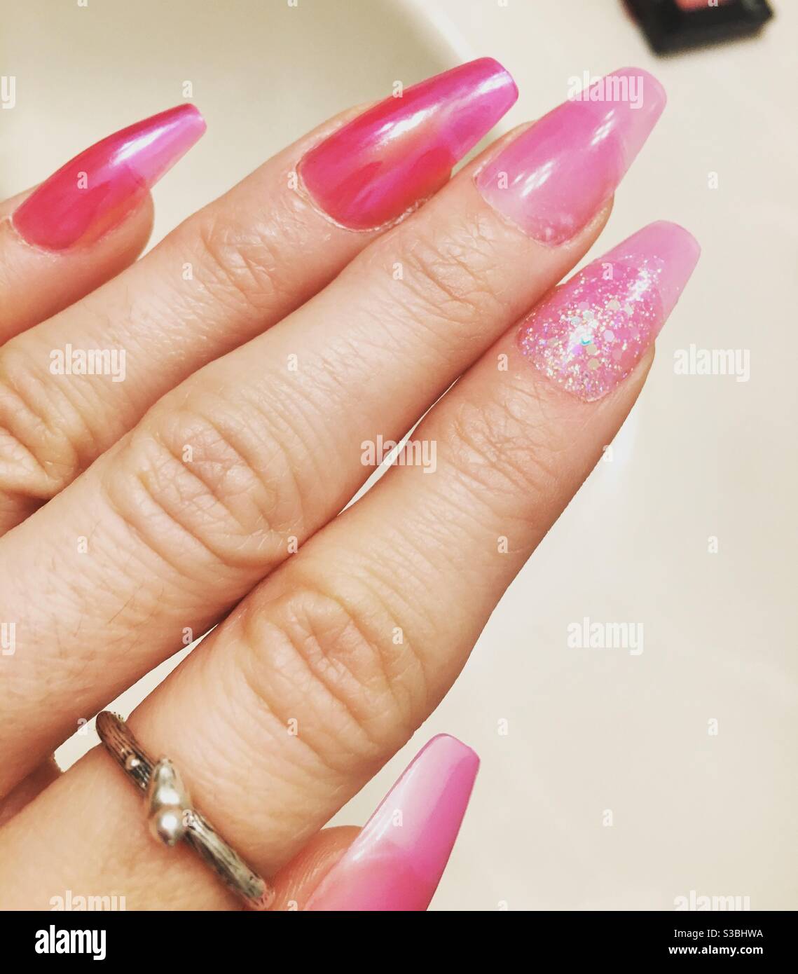 Barbie pink nails hi-res stock photography and images - Alamy