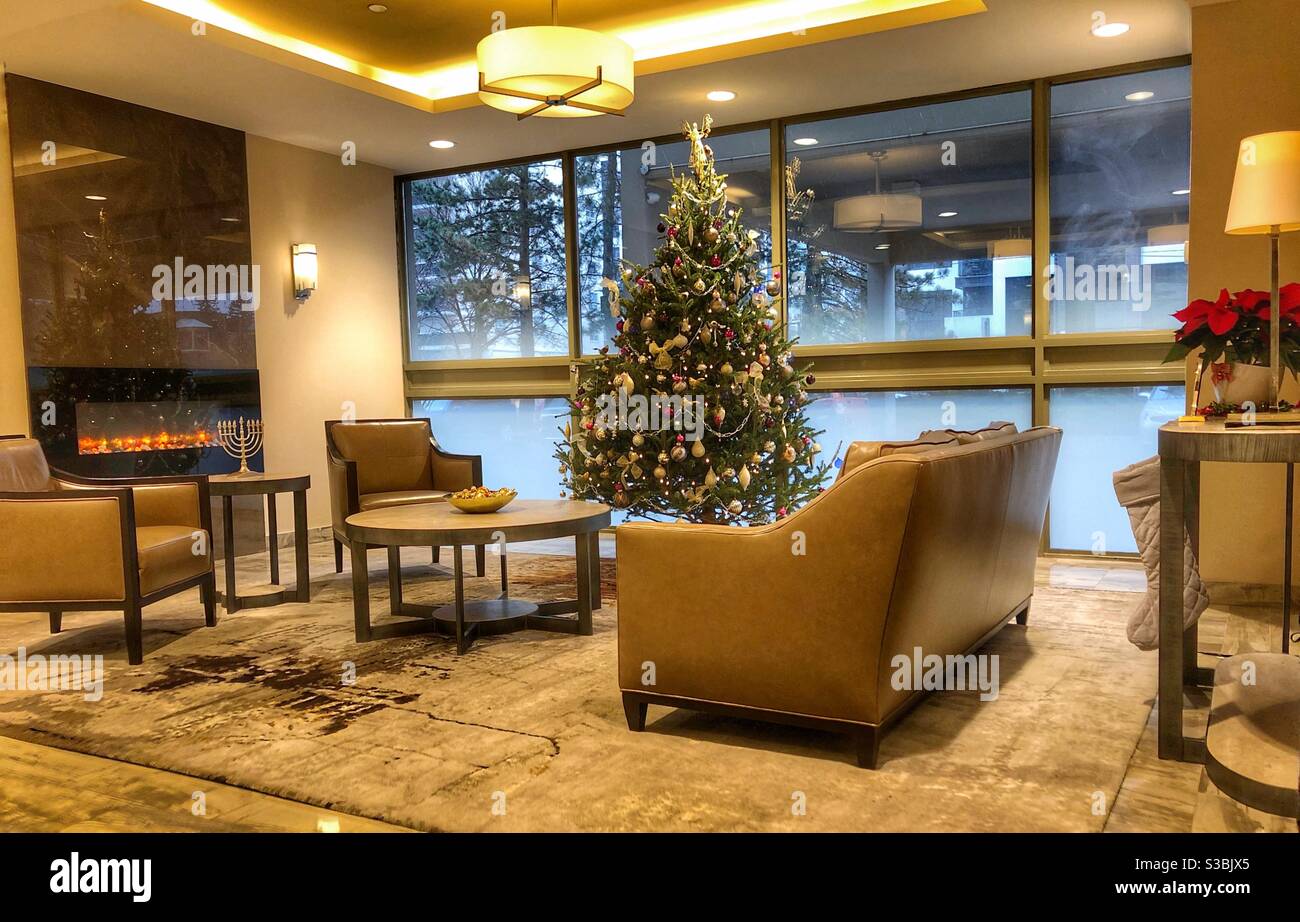 A condo lobby decorated for Christmas. - Smartphone Captured Stock Image