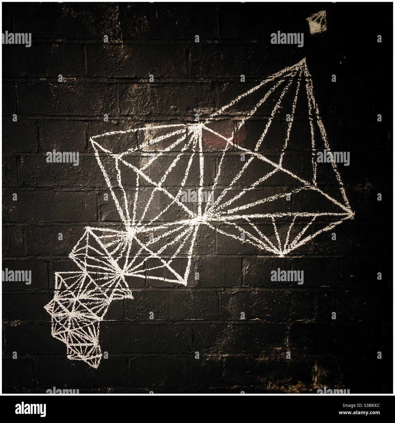 Geometric drawing on a wall Stock Photo