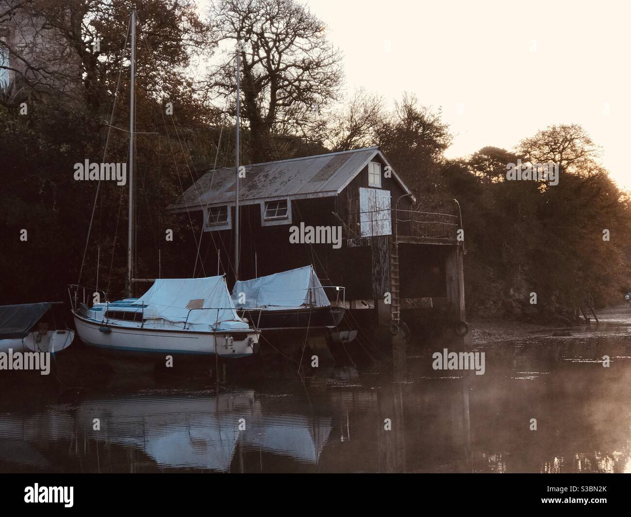 Boathouse in misty December Pill Creek morn - Smartphone Captured Stock Image