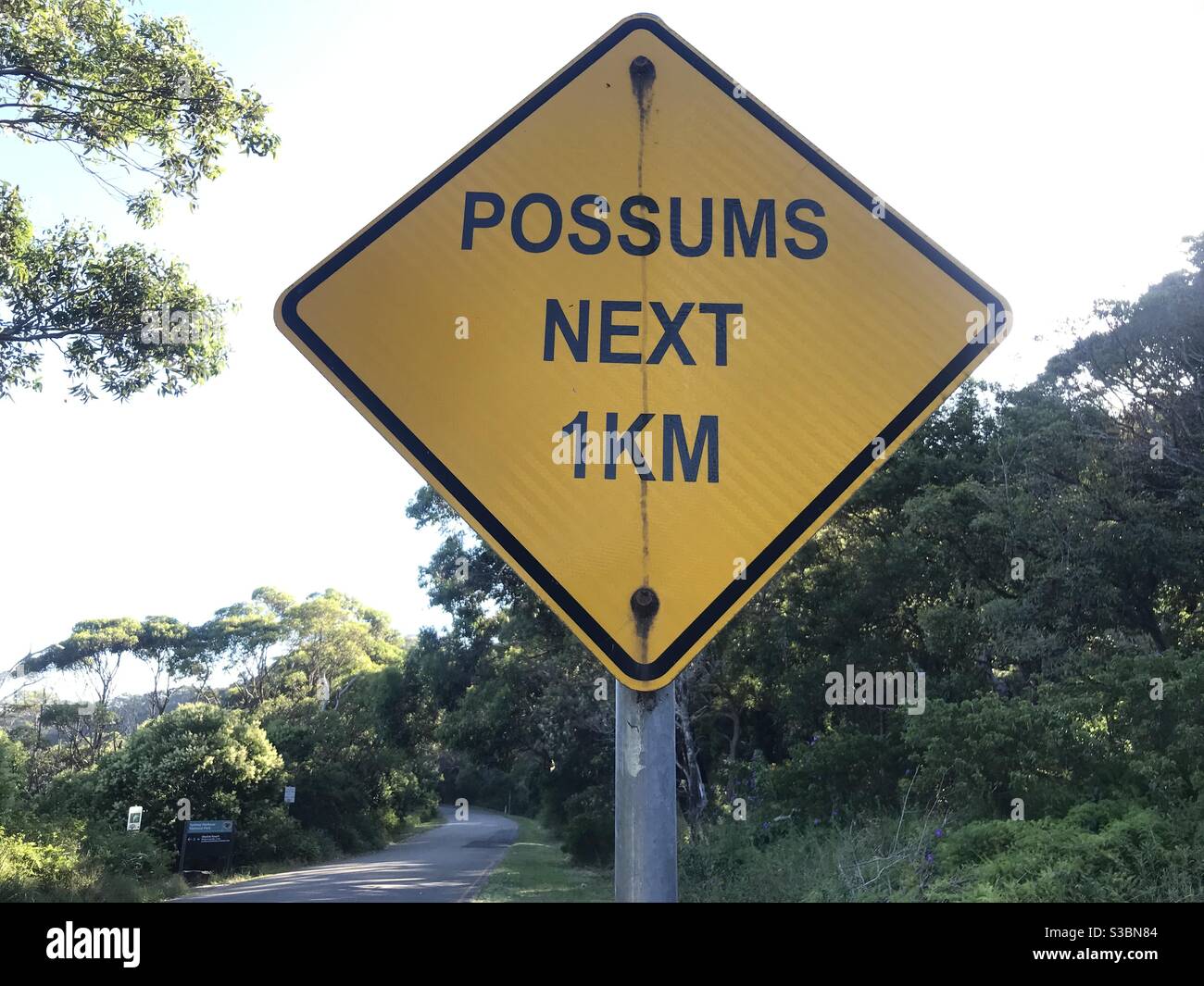 Possums next 1km road sign on Chowder Bay Road, Mosman, Sydney, NSW
