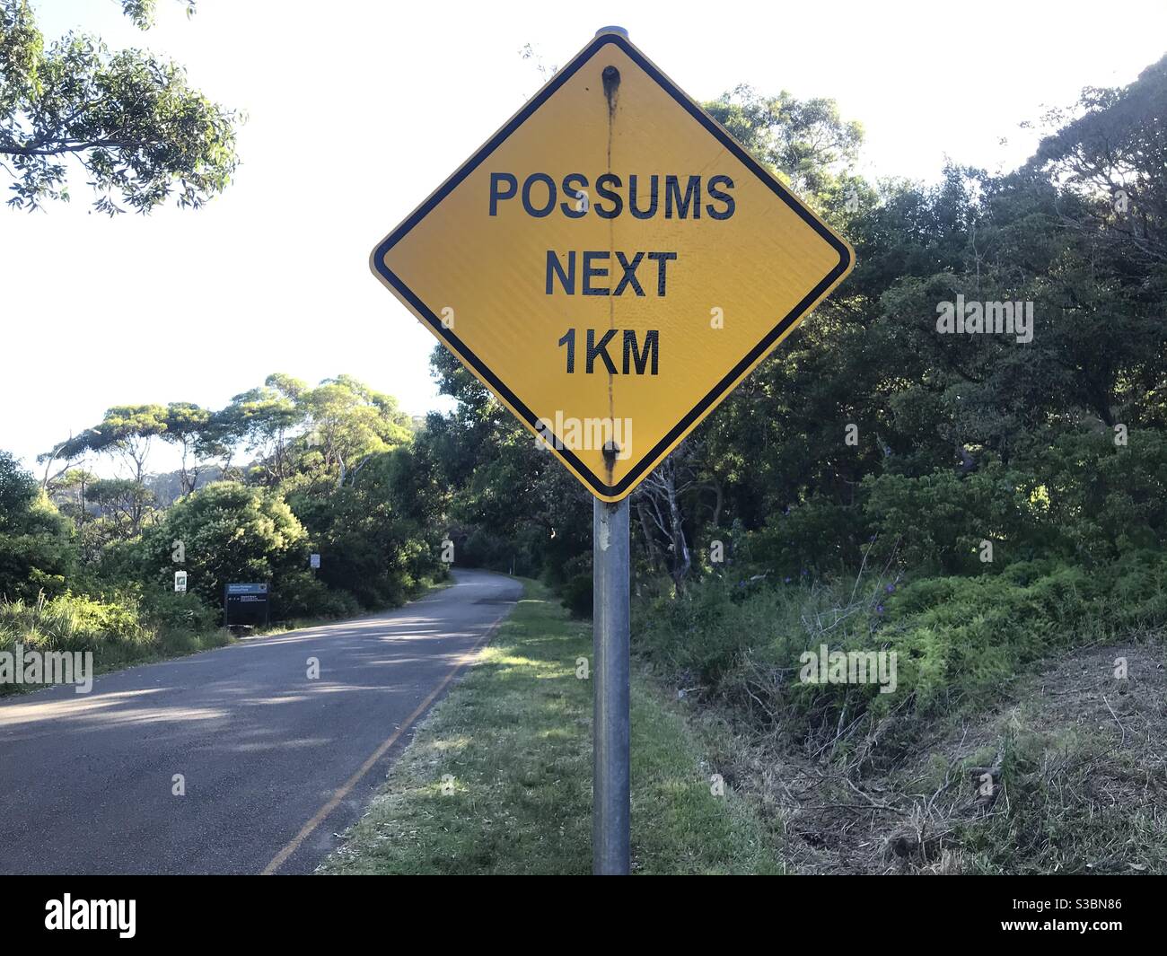 Possums next 1km road sign on Chowder Bay Road, Mosman, Sydney, NSW