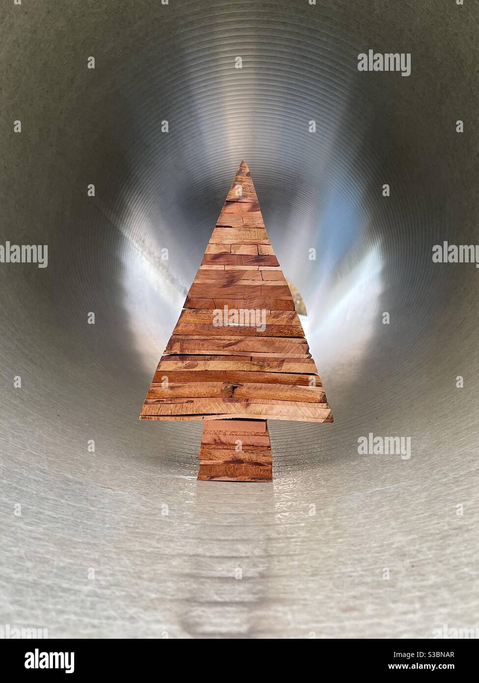 Wooden stylized Christmas tree in a tube Stock Photo Alamy