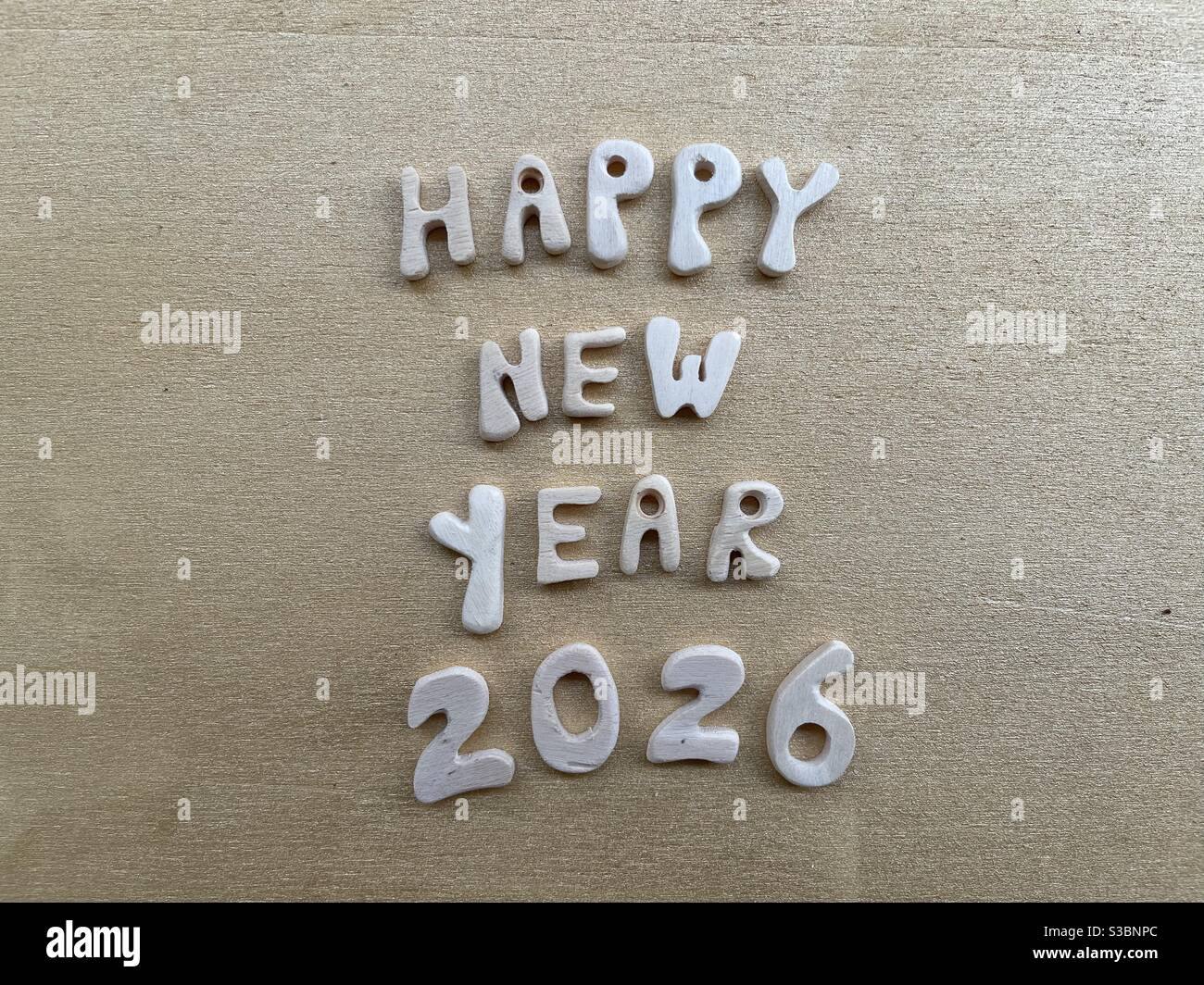 Happy New Year 2026 with wooden letters and numbers Stock Photo Alamy