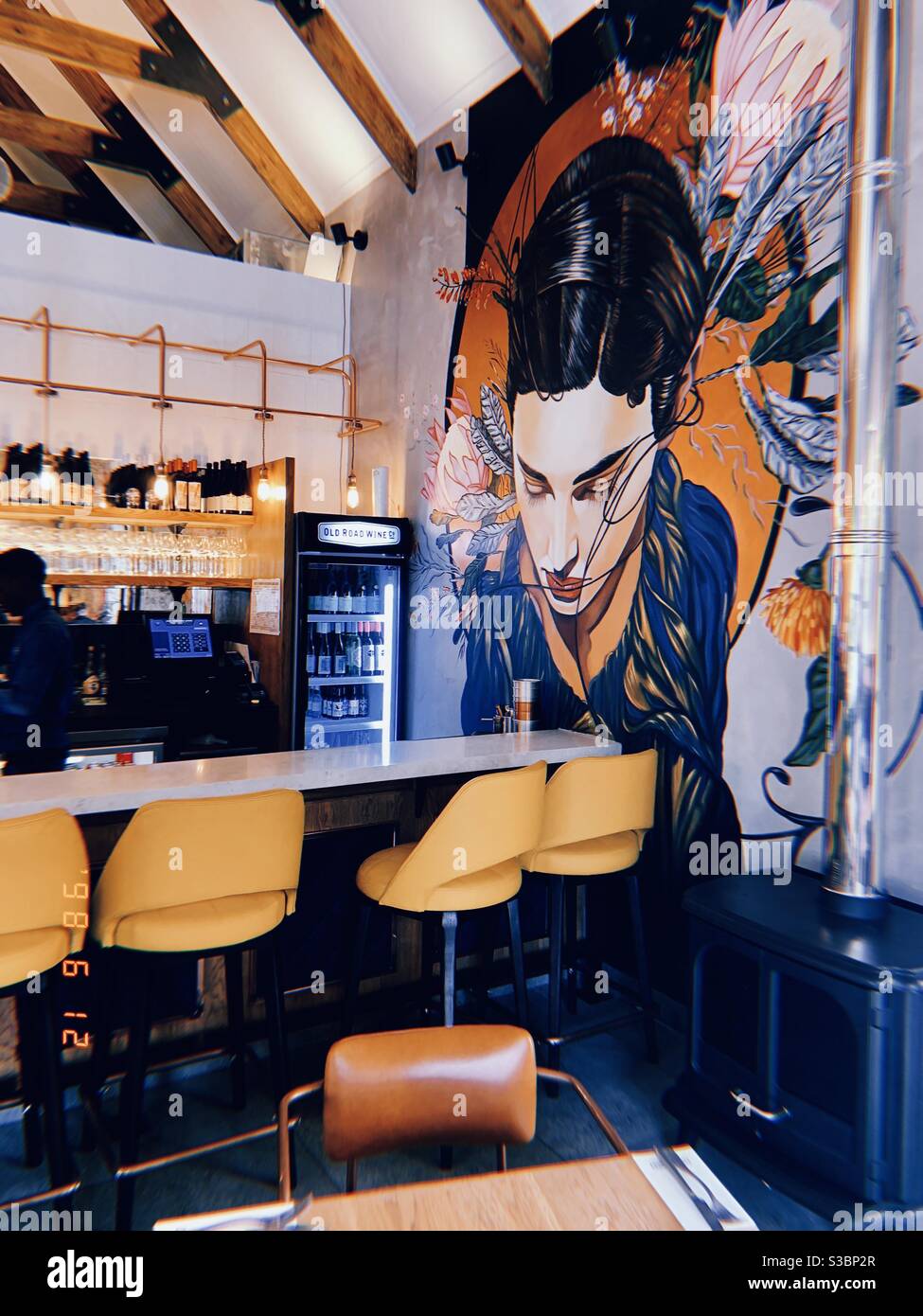 Coffee shop with mural Stock Photo
