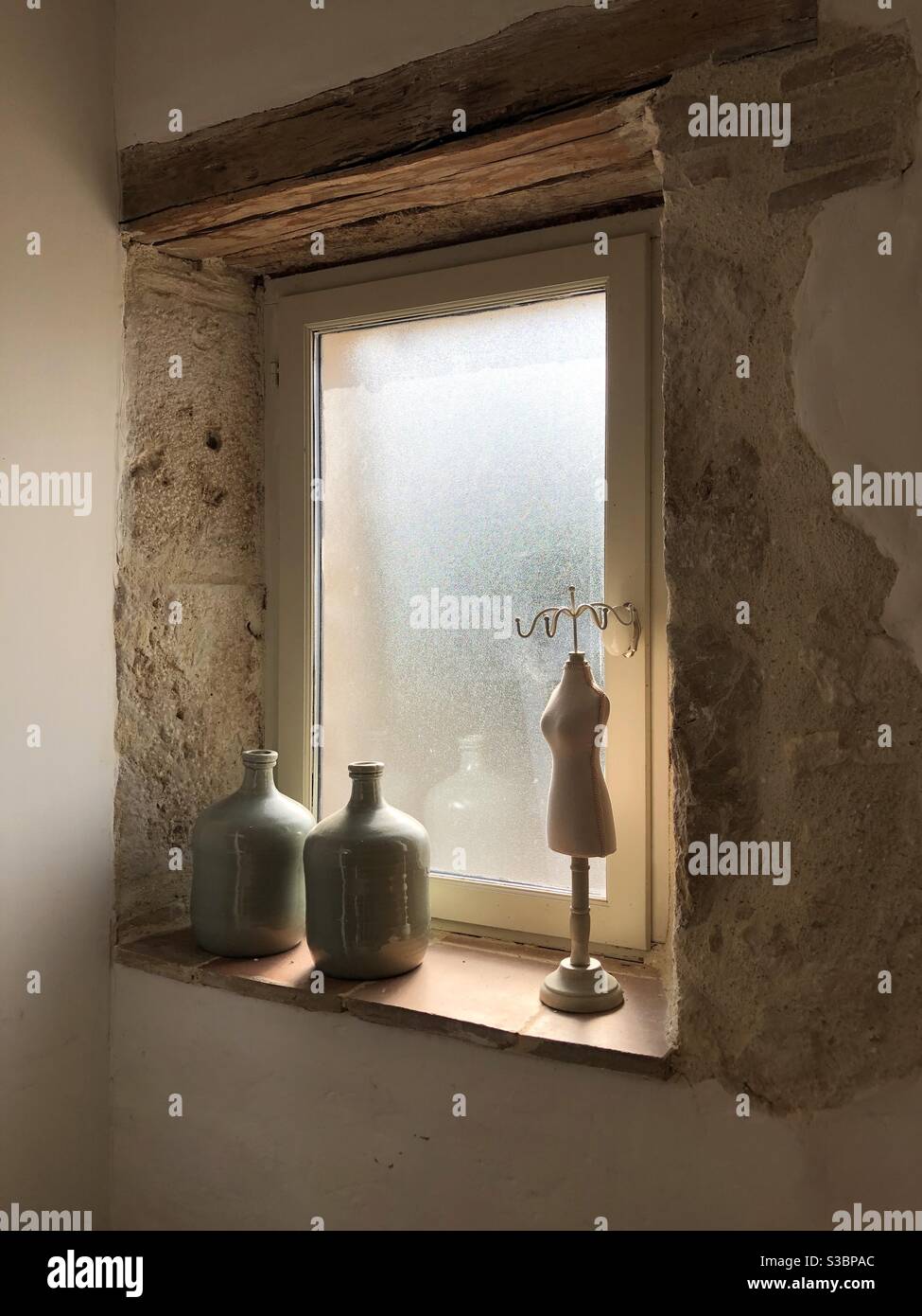 Ornaments on the window ledge of a bathroom Stock Photo Alamy