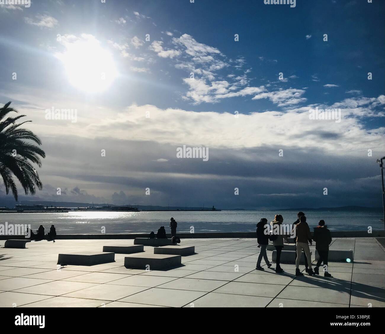 A sunny day in December at the seafront in Split, Croatia - Smartphone Captured Stock Image