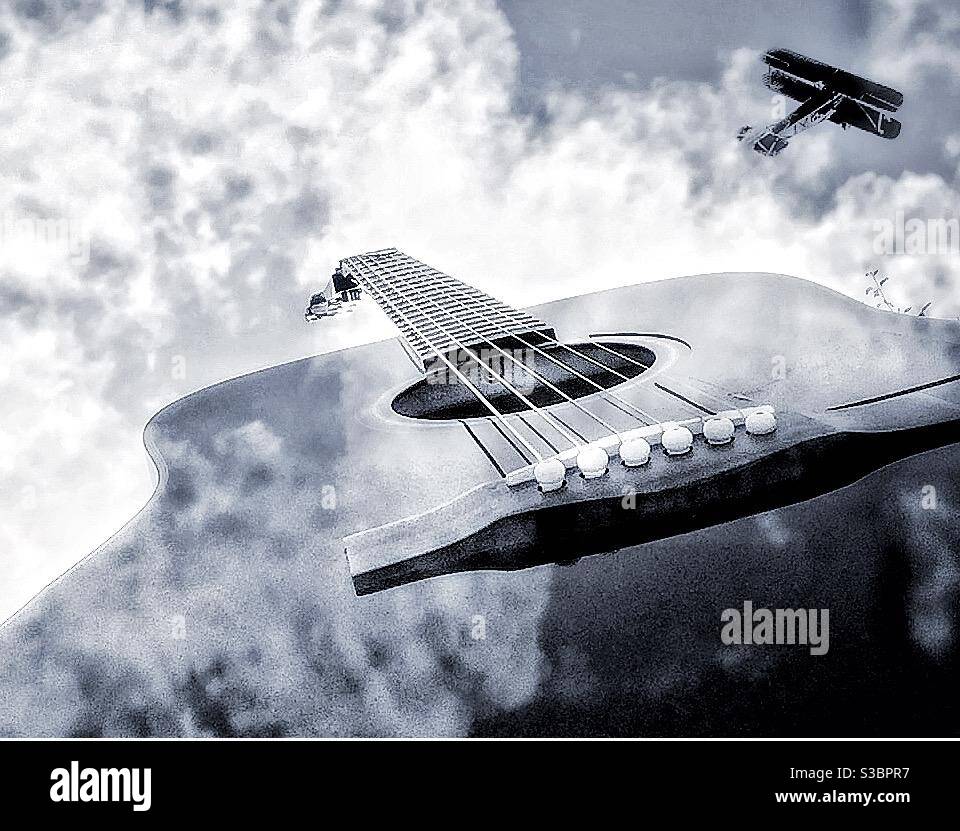 Guitar clouds and plane. - Smartphone Captured Stock Image