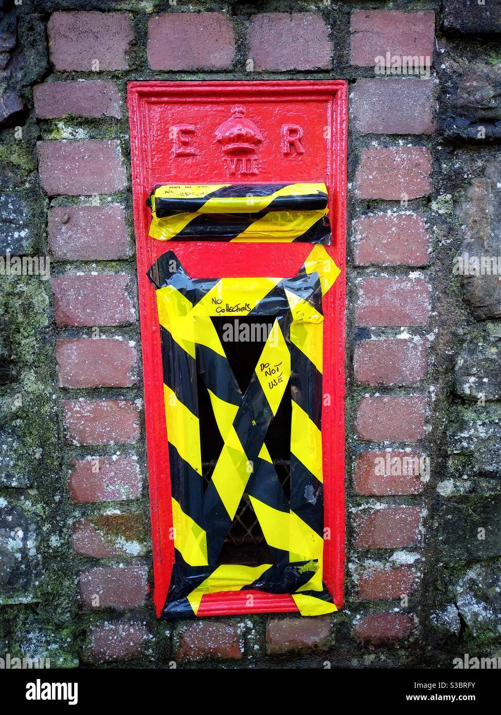 Royal Mail postbox collection point taped up out of use due to vandalism. - Smartphone Captured Stock Image