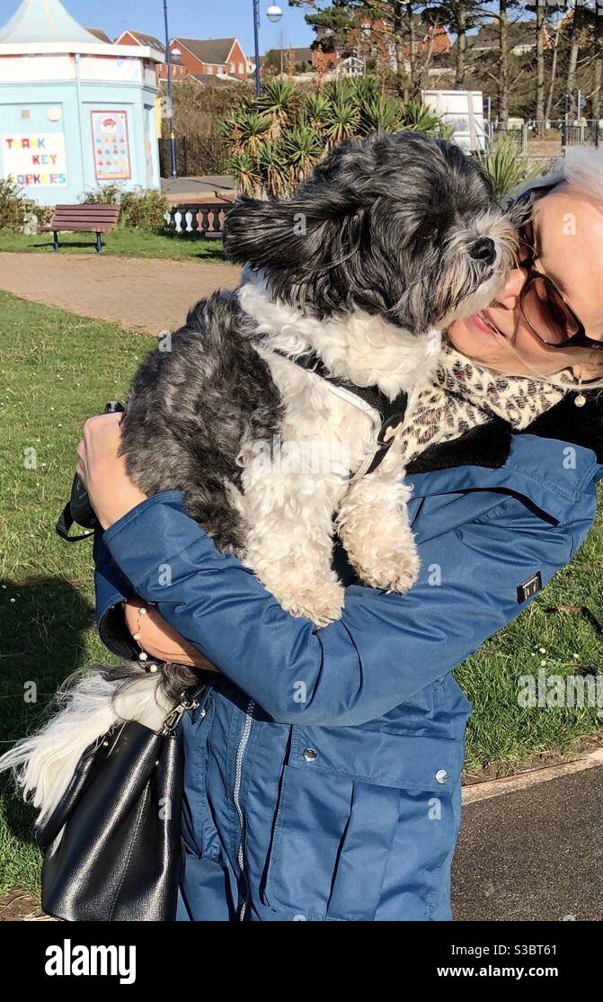 Woody the dog with his proud mummy on a windy day - Smartphone Captured Stock Image